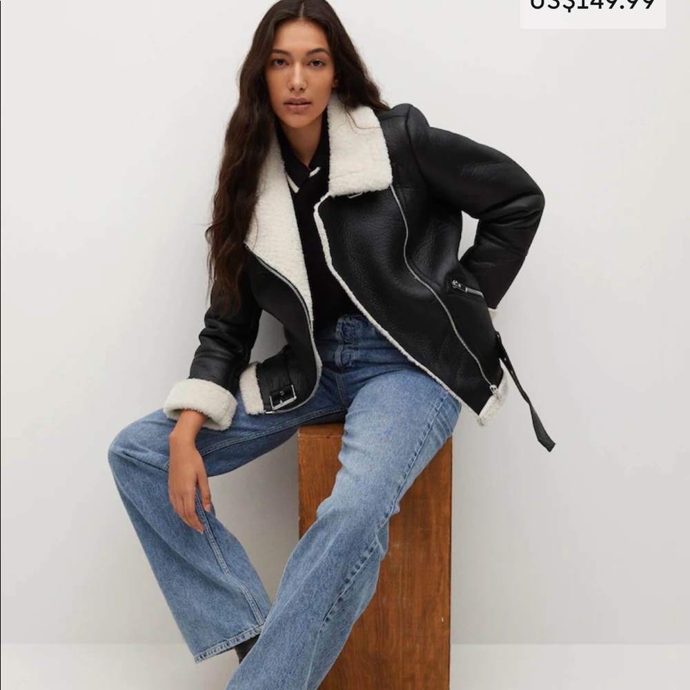 Faux shearling oversized coat. Black with white faux fur detail.